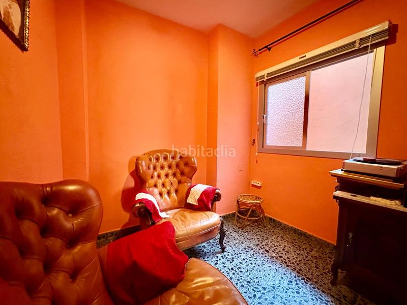 Foto a257a009-11d5-4fff-a4d0-dbb2cb2b8f5f. Casa adosada  de 3 plantas en el molinillo en Málaga
