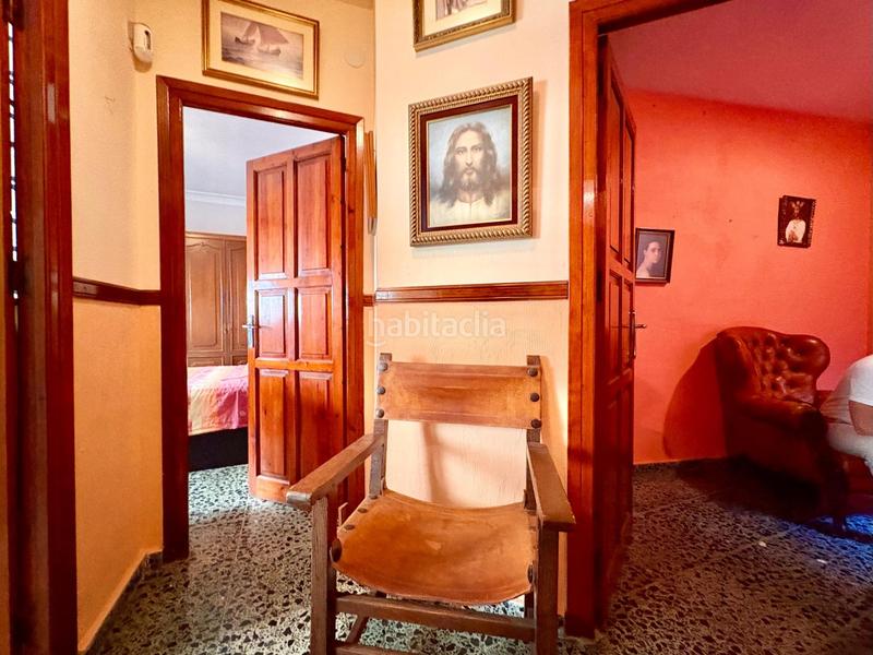 Foto c0bfbcbd-e01b-4dd0-ba03-9c3d77c7e156. Casa adosada  de 3 plantas en el molinillo en Málaga