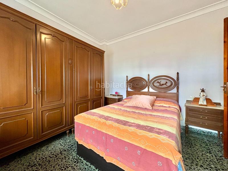 Foto ce1cd65a-c4e4-4b27-b880-39cb983b8eb0. Casa adosada  de 3 plantas en el molinillo en Málaga