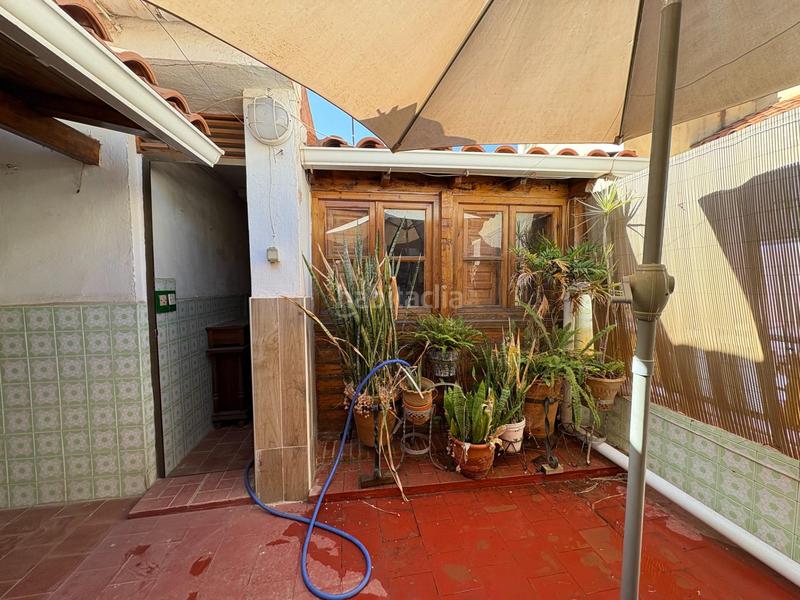 Foto dffe52ad-a6e1-4307-8cff-6efe412db5c7. Casa adosada  de 3 plantas en el molinillo en Málaga