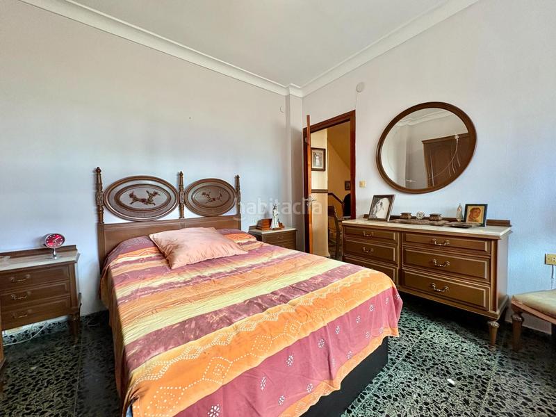 Foto ffdaf747-ad1a-4ed4-b647-653ca27a18d5. Casa adosada  de 3 plantas en el molinillo en Málaga