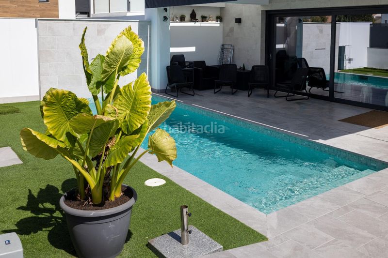 Foto 1604cc4b-88b8-4e9f-8e4a-3f36aa930f4c. Casa aparellada amb calefacció aparcament piscina a Alhaurín de la Torre