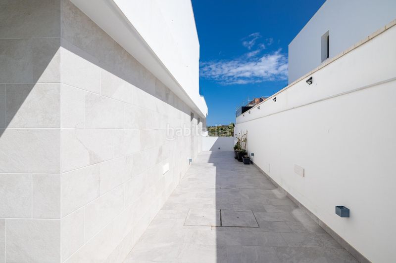Foto 5d8b47e8-4777-4686-aefd-fd046e268c6e. Casa aparellada amb calefacció aparcament piscina a Alhaurín de la Torre