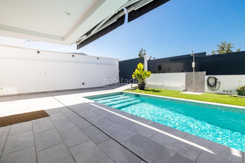 Foto ad5ff09f-eb30-48d9-9f22-e218827281bf. Casa aparellada amb calefacció aparcament piscina a Alhaurín de la Torre