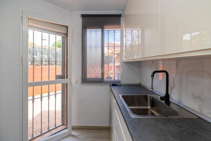 Foto c60c37e7-5ea5-4a75-8a4b-122fe0ba83a7. Casa aparellada amb aparcament a San Alberto - La Alcubilla - Florisol Málaga