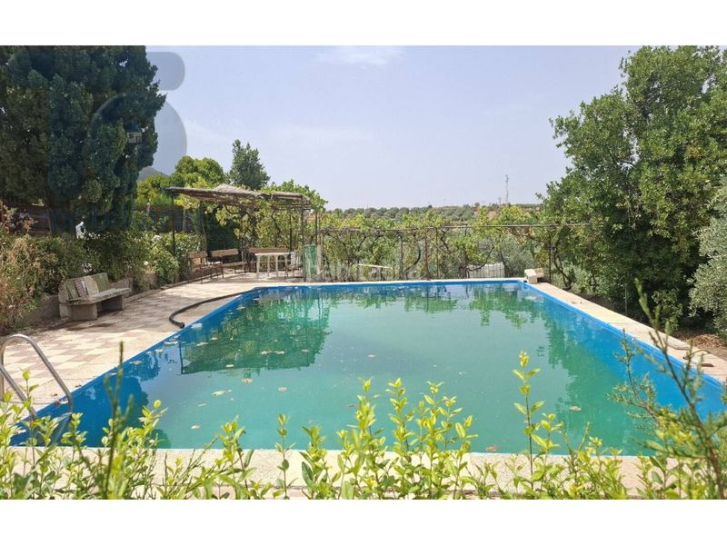 Foto 50b57e74-fa61-4838-8024-9a5f42949c6e. Masia amb aparcament piscina a Cogollos de la Vega