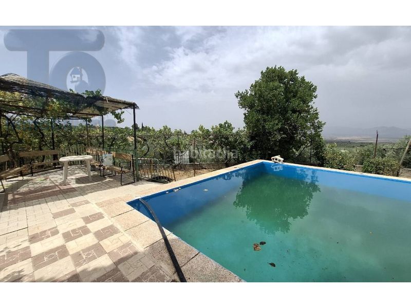 Foto c58dc31c-3515-4bd8-bce7-60dd7872dbcd. Masia amb aparcament piscina a Cogollos de la Vega