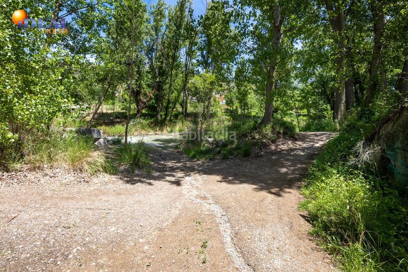 Foto c8e03636-6c75-4ff7-a9c8-764721781935. Rural plot in Cenes de la Vega