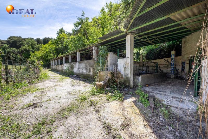 Foto c926aab8-6618-4029-8905-17fc0e2163d8. Rural plot in Cenes de la Vega