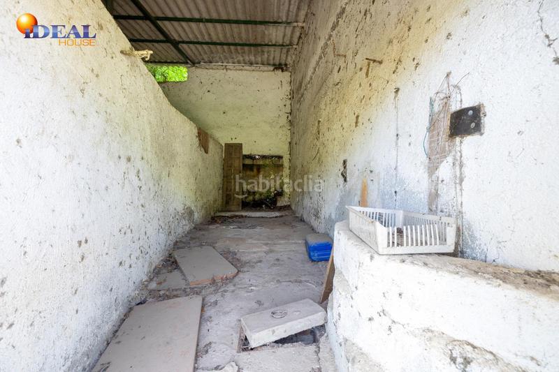 Foto f30e6591-c8a9-42d6-ab59-b80b9900946f. Rural plot in Cenes de la Vega