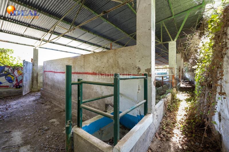 Foto f6d1ff96-a259-4b5d-b5bf-6283ccf97bfc. Rural plot in Cenes de la Vega