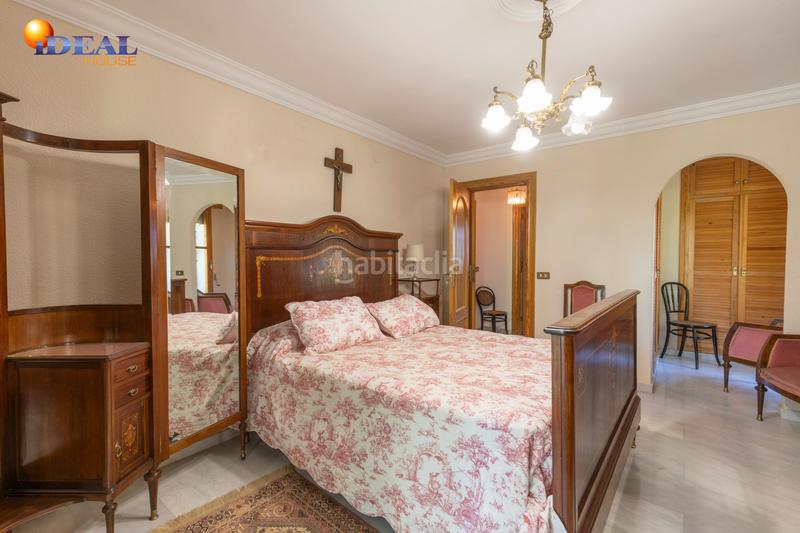 Foto 7f1201a6-ab3d-4670-9438-226a791e0f9e. Chalet magnifico chalet con amplios jardines y piscina en cortijo del aire! en Albolote