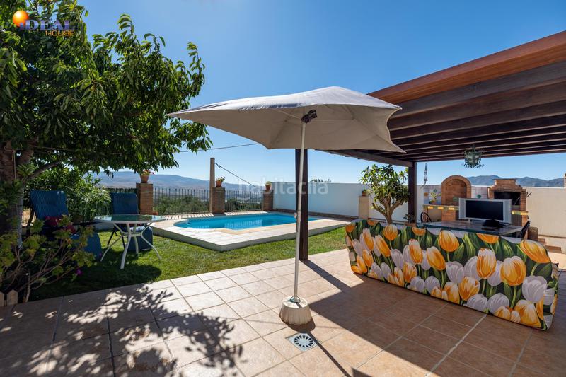 Foto 270bff71-bf27-49fe-9bca-9f27e70d490b. Xalet amb aparcament piscina a Nigüelas