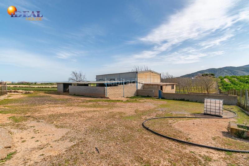 Foto 14740e66-ca92-4c50-868d-28867e06d148. Finca rústica  en venta con casa, nave y piscina en Padul