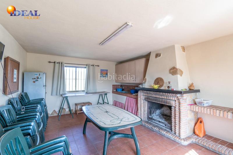 Foto 895df2cd-d7b0-421a-bda6-d84f135dff6b. Finca rústica  en venta con casa, nave y piscina en Padul