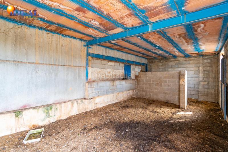 Foto a64df357-a425-4a65-9f75-83eddcc95e0e. Finca rústica  en venta con casa, nave y piscina en Padul