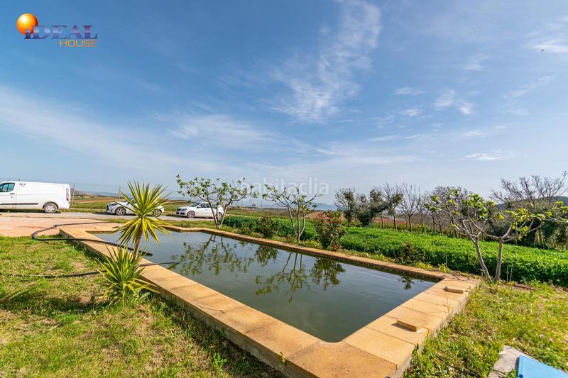 Foto b34068d1-7f12-4668-8af2-08fd100761f9. Finca rústica  en venta con casa, nave y piscina en Padul
