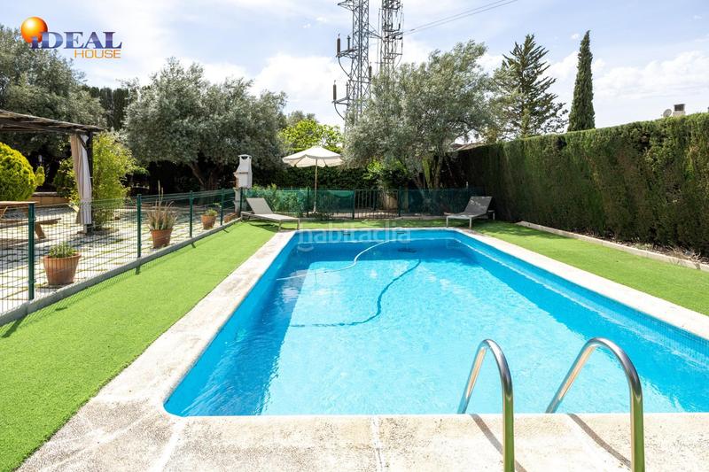 Foto ada121c1-13cf-4e3b-910c-6ee1fa0f8999. Chalet en Albolote