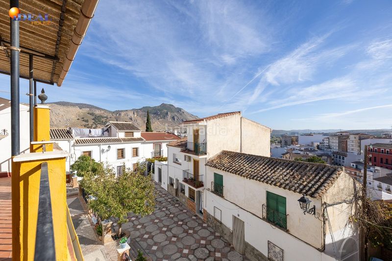 Foto ac6e8dc2-4702-48d6-a6e2-91fbf988d87c. Casa adossada a Loja