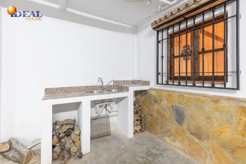 Foto c5f74ca0-42c6-4c91-a7d6-ecbd8b815986. Casa adossada amb aparcament a Fuente Vaqueros