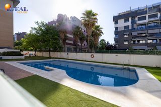 Planta baixa a Parque Lagos. Apartamento tipo loft con garaje incluido y piscina en zona parq