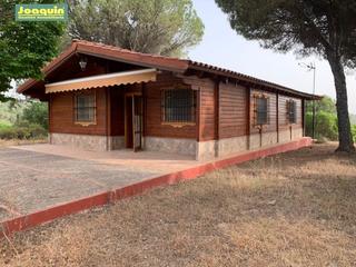Terreny residencial a Las Jaras. Parcela con casa de madera de pino sueco  no hipotecable.