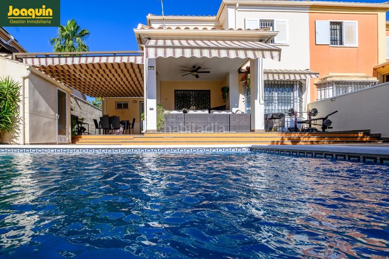 Foto 12a00164-7e0c-41d6-bda0-c0538306fef8. Casa aparellada amb aparcament piscina a Paraíso Arenal - La Colina Córdoba