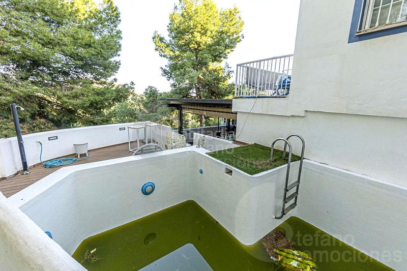 Foto 5c63bd9e-0133-4f99-9493-77f377b2d1d9. Maison jumelée avec chauffage parking piscine dans El Candado Málaga