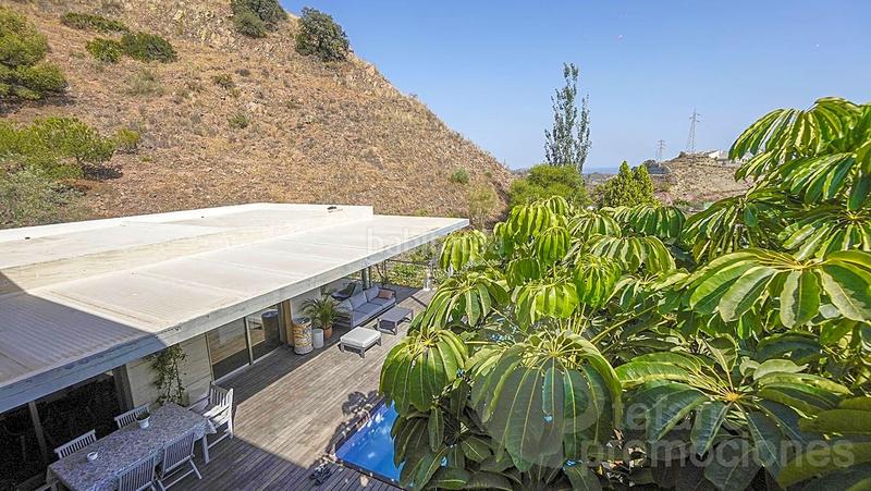 Foto c52e8652-69e6-46da-8963-4d6cea7b8a88. Casa con riscaldamento parcheggio piscina in Pinares de San Antón Málaga