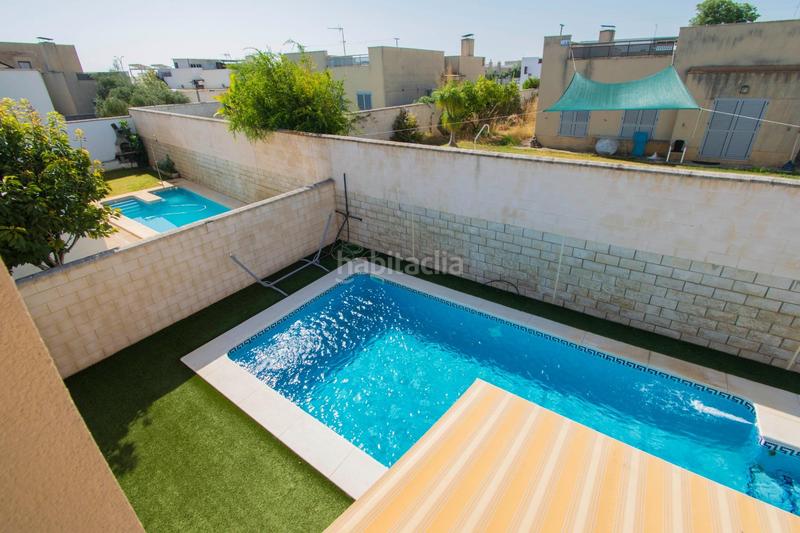Foto 7759b468-0713-4723-bf5f-2f3fb5ce22dd. Casa amb calefacció aparcament piscina a Espartinas pueblo Espartinas