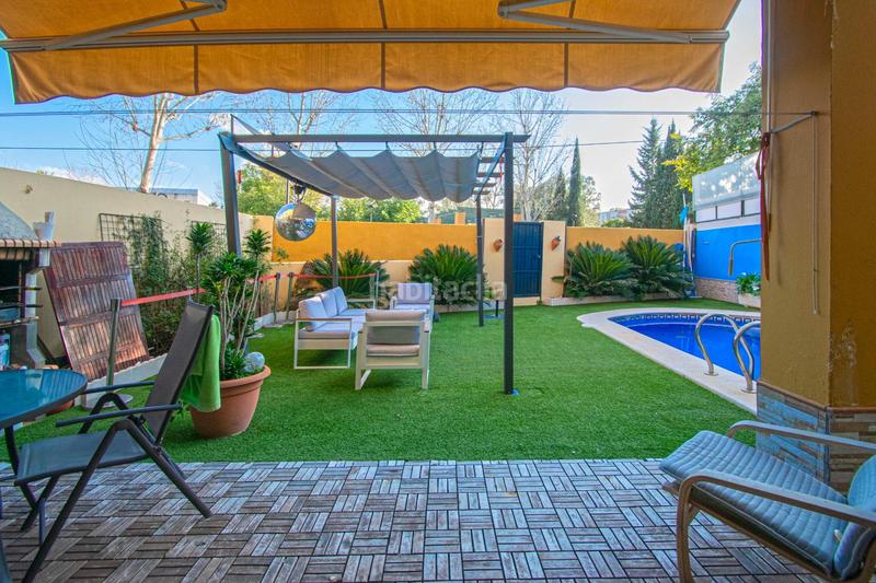 Foto 661fd93f-9157-4877-8f89-e1f27b10bb44. Casa bifamiliare con parcheggio piscina in Nueva Alcalá Alcalá de Guadaira