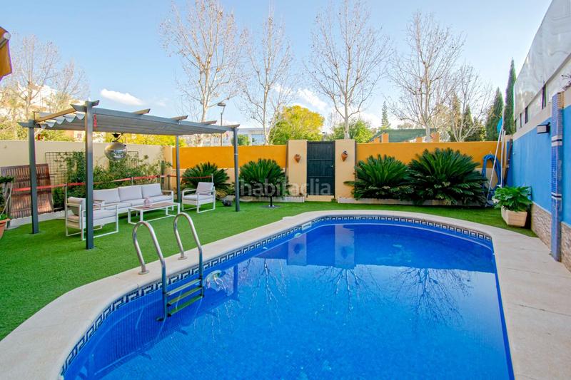 Foto cabaa2a8-be0f-4a69-82d6-b73dd744d47a. Casa bifamiliare con parcheggio piscina in Nueva Alcalá Alcalá de Guadaira