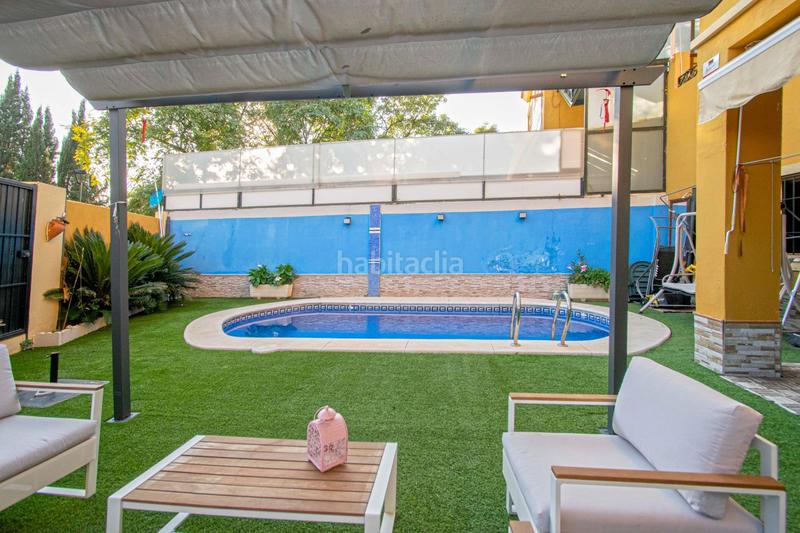 Foto d810d3cf-5ace-4790-aada-7749d67fd8c3. Casa bifamiliare con parcheggio piscina in Nueva Alcalá Alcalá de Guadaira