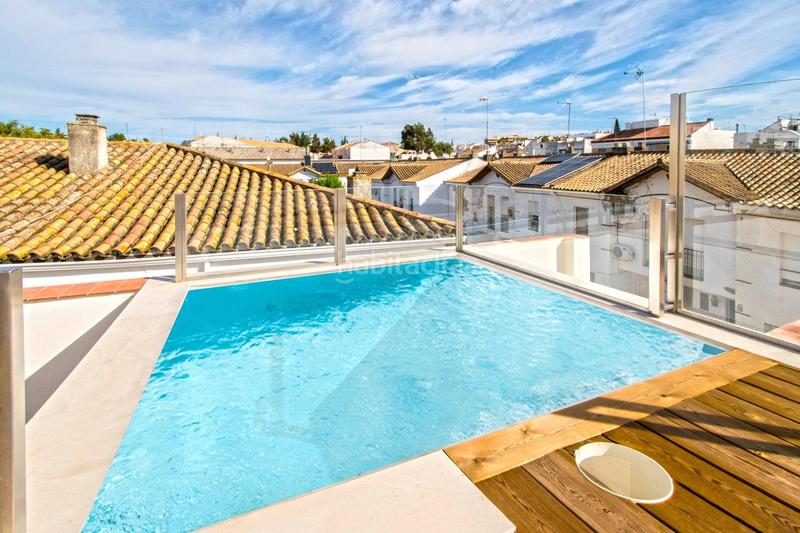 Foto a62d157e-8d37-42b9-9fa3-4bc721119e18. Casa adossada amb aparcament piscina a Las Almenas Tomares