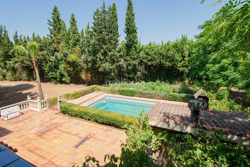 Foto 30caba2f-31de-440b-84d1-4c165d27f2dc. Chalet con riscaldamento parcheggio piscina in Palomares del Río