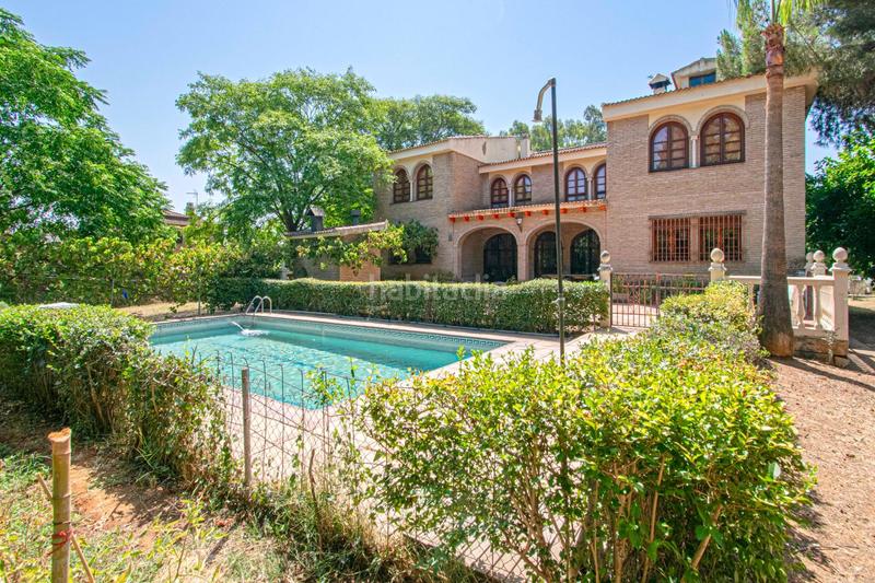 Foto f43a1872-886f-46d9-a023-684f0338413d. Chalet con riscaldamento parcheggio piscina in Palomares del Río
