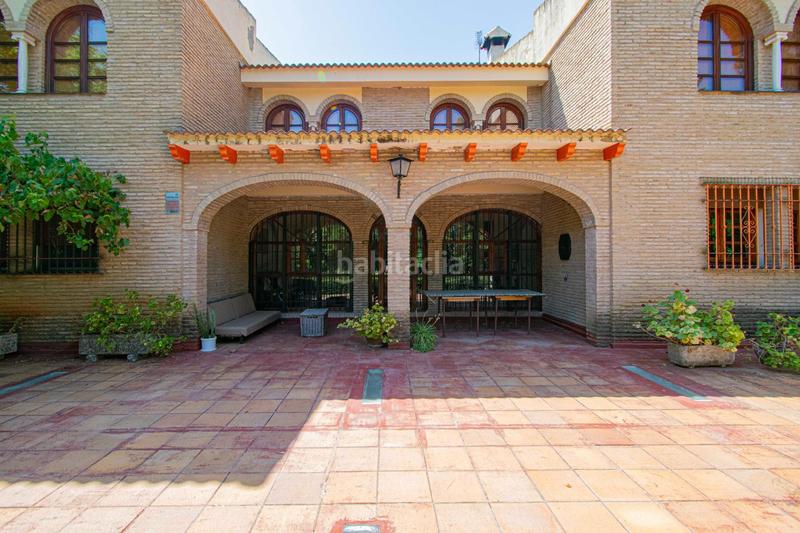 Foto f54a1166-b28f-4c74-b6fc-f7cfb2385345. Chalet con riscaldamento parcheggio piscina in Palomares del Río