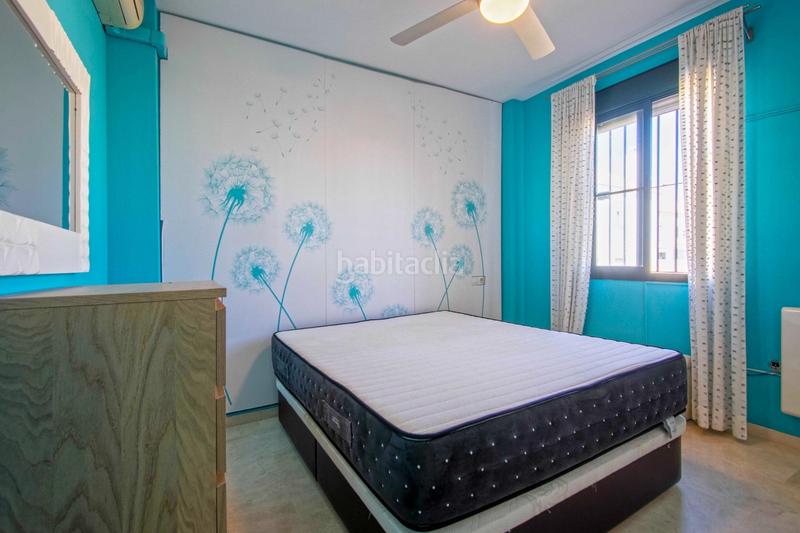 Foto 2826b225-5745-41ed-8b6a-c02fd8c72f8d. Casa aparellada amb piscina a Oromana Alcalá de Guadaira