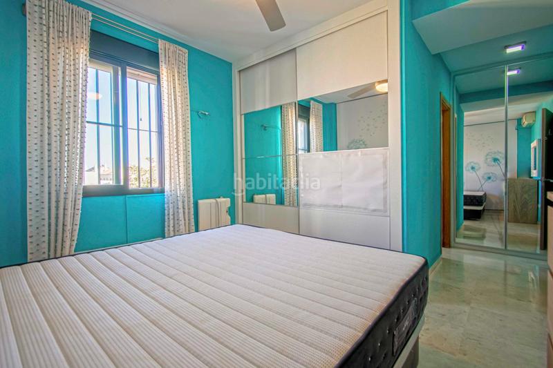 Foto 905c82c0-205d-45c3-86ee-847c3fac6a51. Casa aparellada amb piscina a Oromana Alcalá de Guadaira