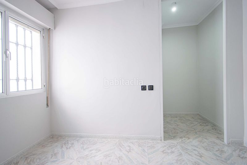 Foto 56524e31-d5b9-448f-a280-74e4c9a2fd70. Casa amb calefacció aparcament a Barrio del Nervión Sevilla