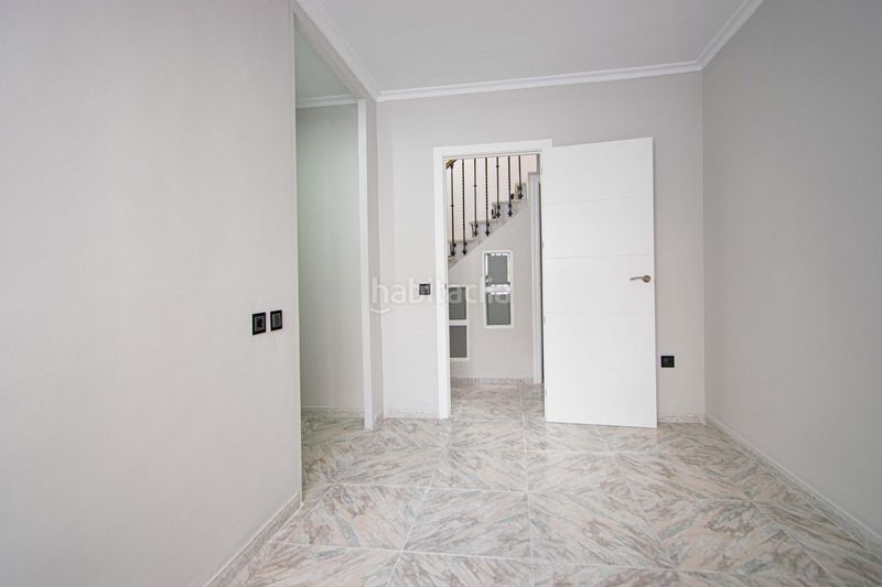 Foto ae467ada-5ad7-4daa-99cc-972e93d9f55d. Casa amb calefacció aparcament a Barrio del Nervión Sevilla