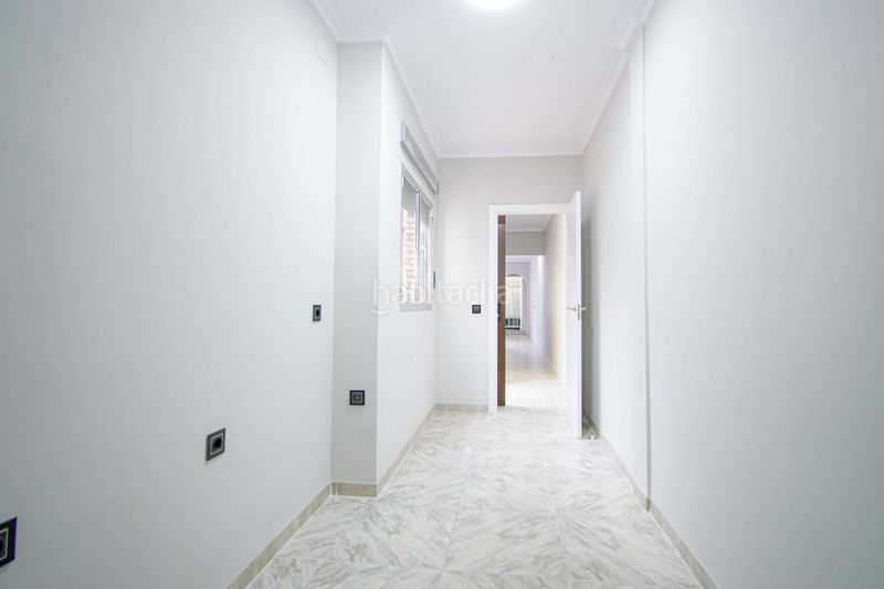Foto b6e9f7d5-b60c-42b4-b577-71688b8fd1c2. Casa amb calefacció aparcament a Barrio del Nervión Sevilla