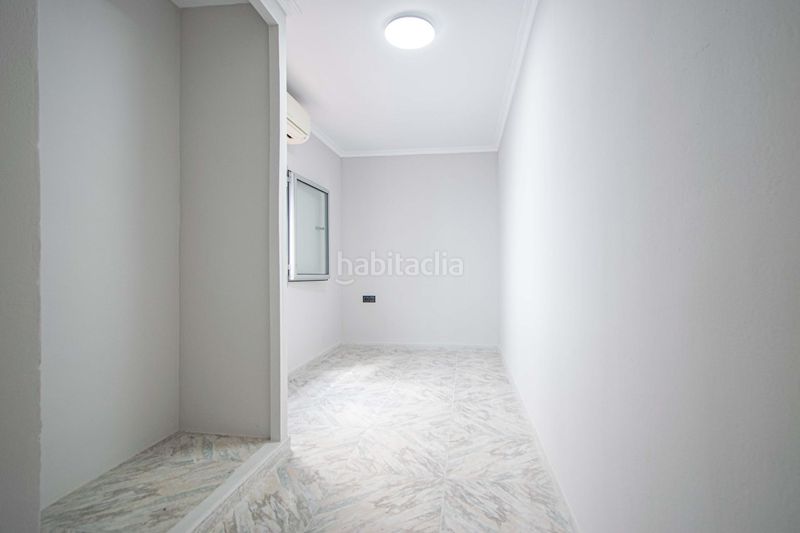 Foto eac44c98-2f86-4283-9a6b-318721f02f42. Casa amb aparcament a Barrio del Nervión Sevilla