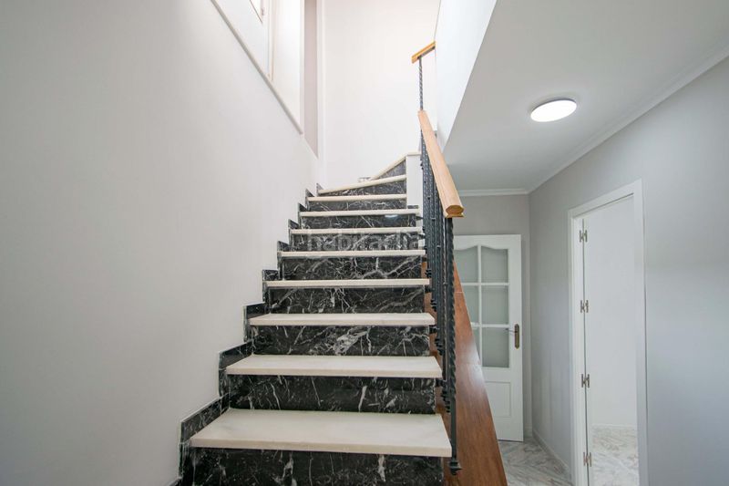 Foto ec391ae9-c55a-4c68-bdcf-529a71c54413. Casa amb aparcament a Barrio del Nervión Sevilla