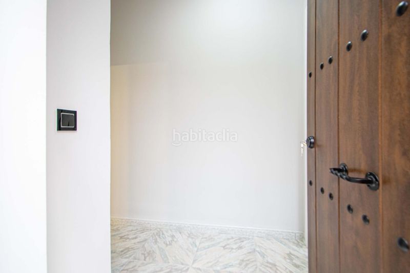 Foto f65f951f-b430-4382-849d-47538a2890e9. Casa amb calefacció aparcament a Barrio del Nervión Sevilla