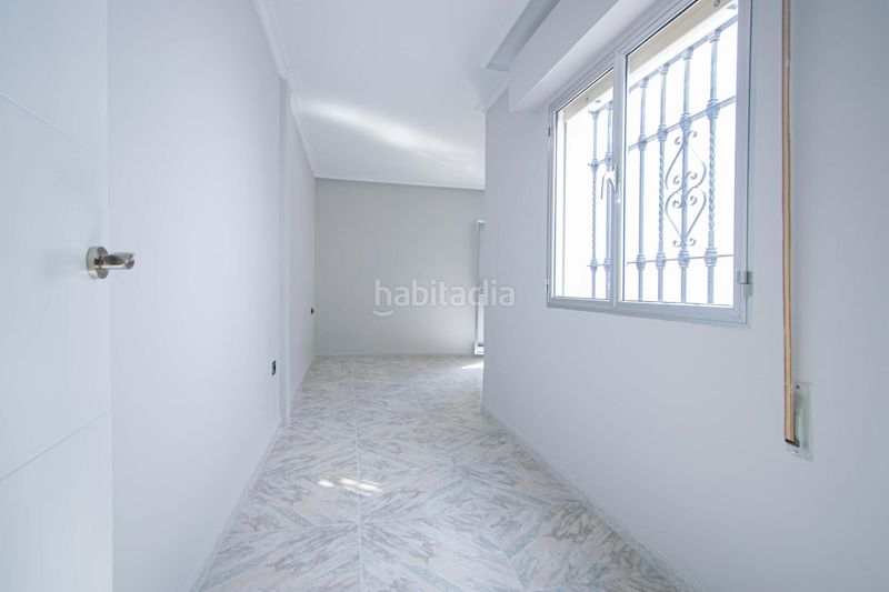 Foto f99efbff-93df-4ee6-90d4-41e4e44d7d38. Casa amb aparcament a Barrio del Nervión Sevilla