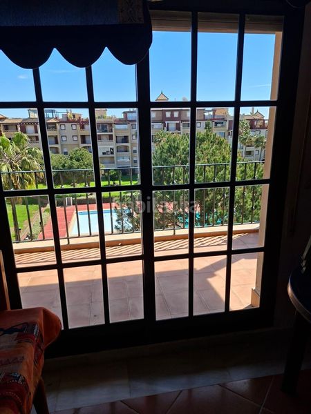 Foto 43a3cd4d-3025-4311-81a9-3f32bd915f9c. Apartament amb aparcament piscina a Isla Canela Ayamonte
