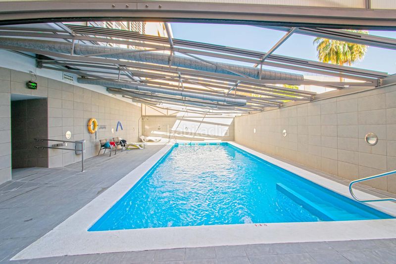 Foto d7bb35d8-c4ef-48d0-8070-bde9d751da5b. Pis amb aparcament piscina a La Calzada - La Florida Sevilla