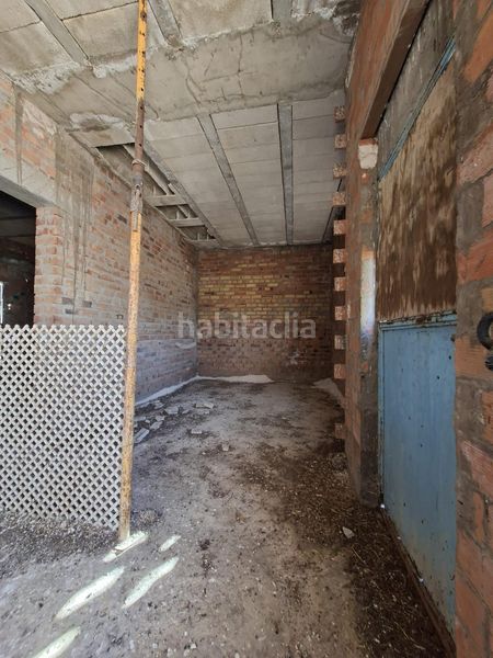 Foto 54bbb627-1521-4920-ada1-fb89bb315bba. Casa a Guillena pueblo Guillena