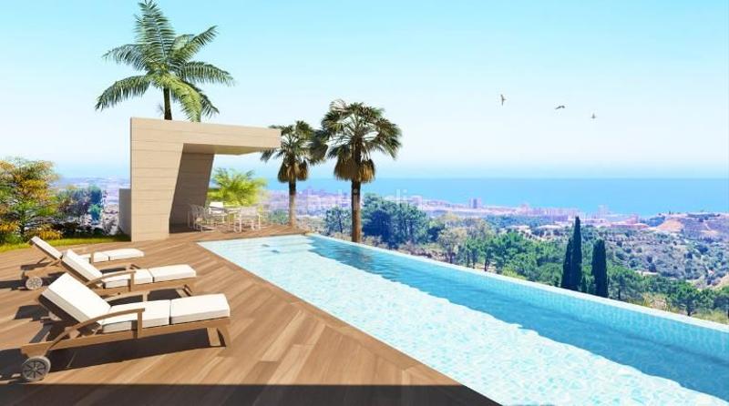 Foto e20d5ed6-e9a2-42ab-b6aa-0a1bc7f6f2a7. Casa nuevo proyecto de villas que consta de solo 5 unidades con increíbles vistas panorámicas al mar desde cada habitación, en una pala en Mijas
